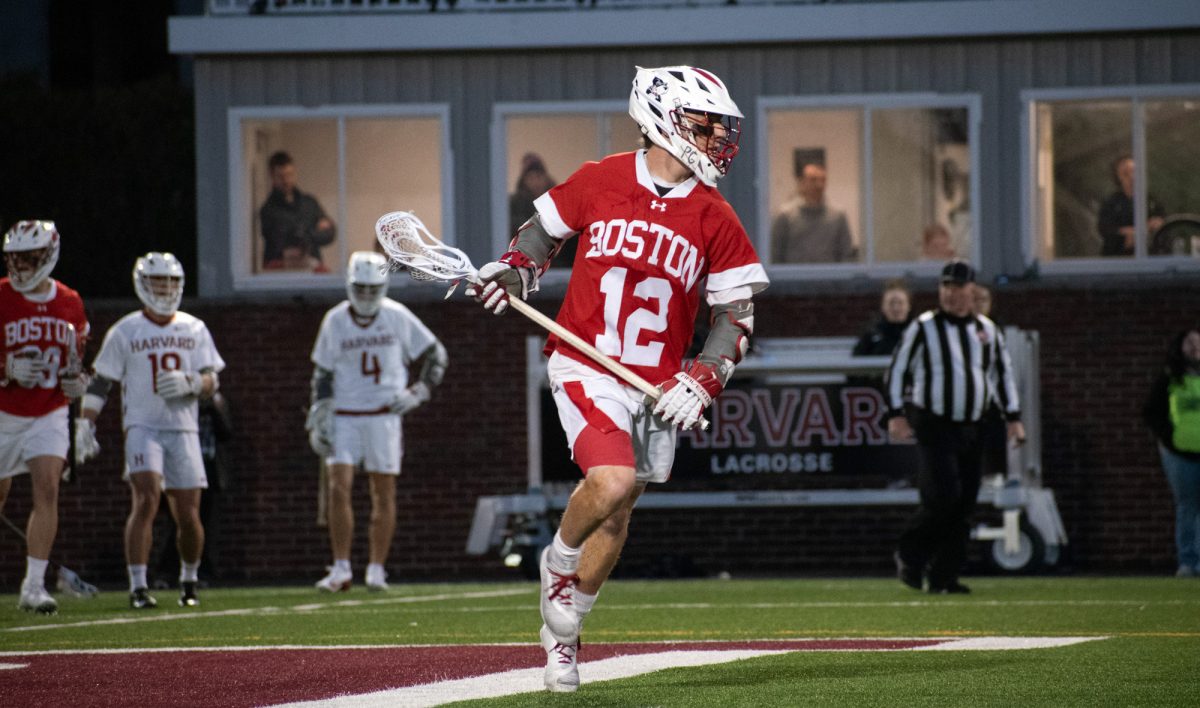 Senior attack Zach Travaglini (12), who tied the game 8-8 in the second half against the Lafayette College Leopards. The Boston University Terriers beat the Leopards 12-10 in The Patriot League men’s lacrosse semifinals May 2. 
JOHN DOWNES/DFP PHOTOGRAPHER  
