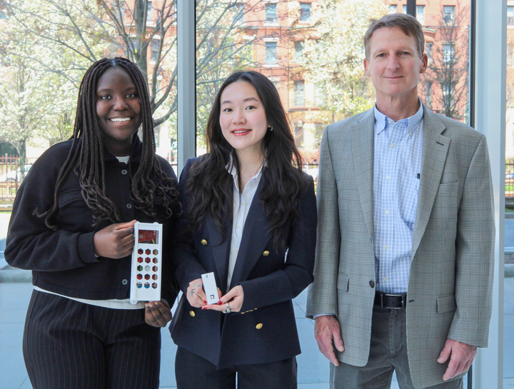 Senior Primah Muwanga and recent graduate Celine Chen, joined by their faculty advisor, Thomas Little, at the 2025 Janetos Award Ceremony. The team won the 2025 Janetos Climate Action Prize in May for their work implementing air quality sensors around campus. 
COURTESY OF LAURA HURLEY
