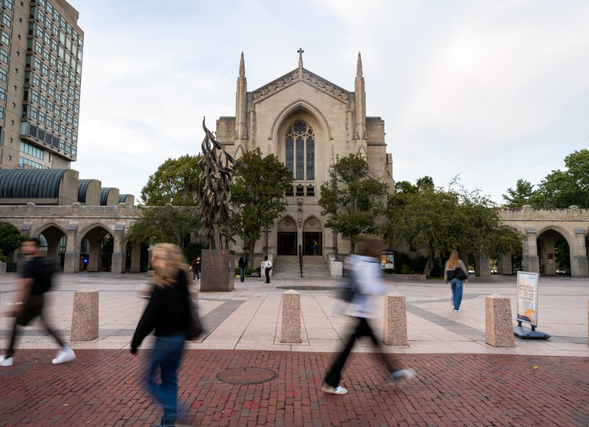 Students walk by Marsh Plaza on Boston University Central Campus. BU recently earned an “F” in a survey of free speech on college campuses by the Foundation for Individual Rights and Expression. 