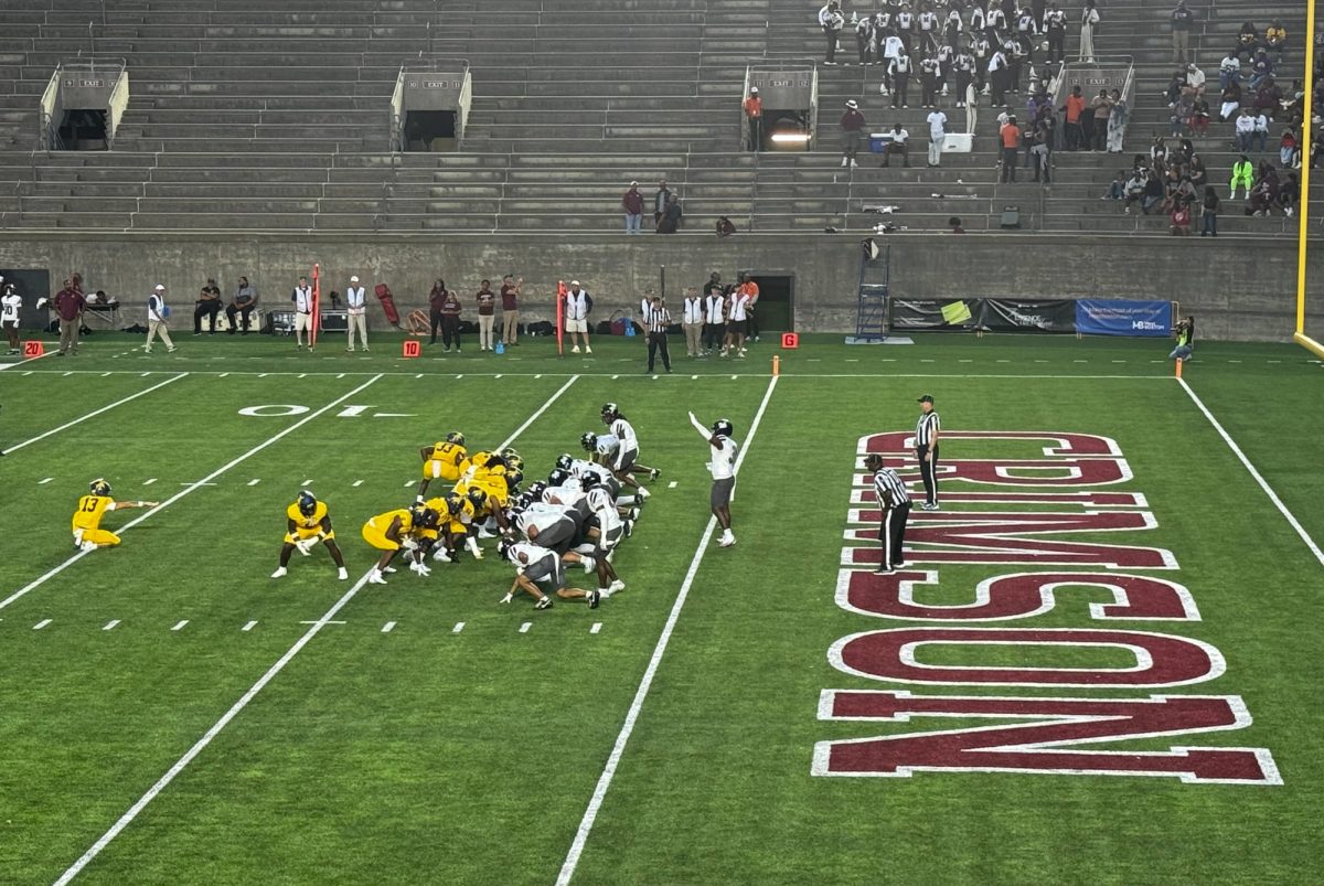 The Morehouse College Maroon Tigers and the Johnson C. Smith University Golden Bulls prepare for a play. The teams faced off at Harvard Stadium Aug. 30, marking the first time in over 50 years that two historically Black colleges competed in Boston. 

