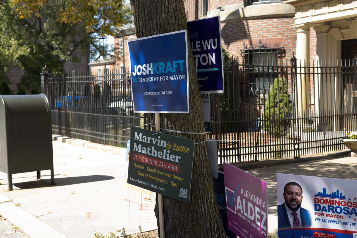 Campaign signs for Boston Democratic mayoral candidate Josh Kraft. Kraft dropped out of the mayoral race Thursday after a 49-point loss to Mayor Michelle Wu in the primary. 