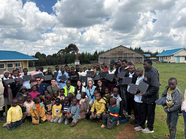 Boston University’s Engineers Without Borders group at the Ogiek Kwanza Secondary School in Tinet, Kenya. The group is making wells and adding water filtration systems to schools in the area. 