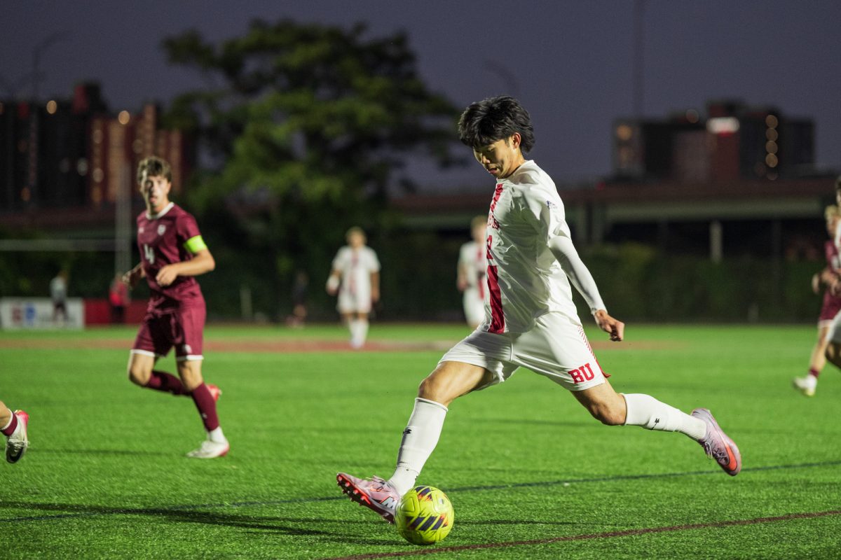 Number 2, senior Ryan Lau winds up for a pass into the midfield. The Boston University Terriers defeated Colgate 1-0 in the men’s soccer game on Friday. 