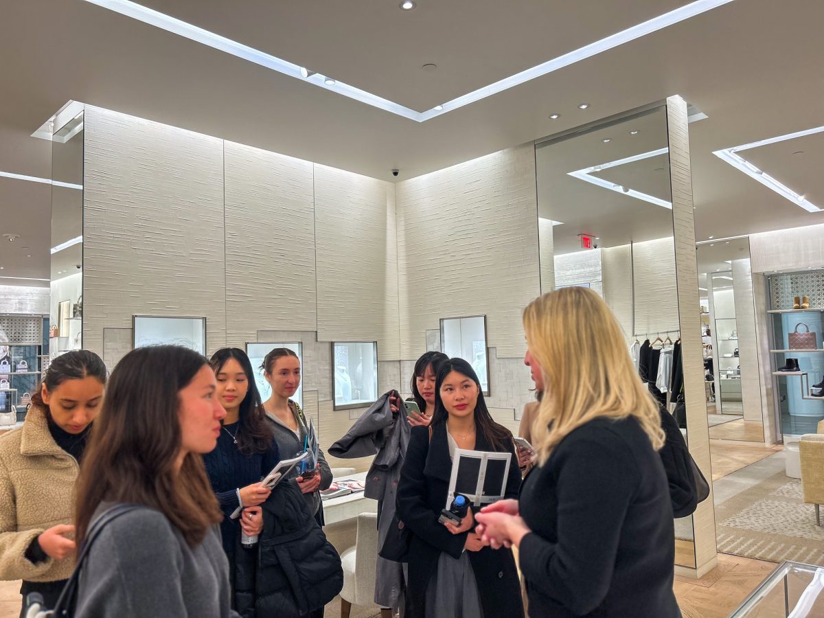 The Director of Four Seasons gives a presentation to Retail, Luxury and Consumer Association members. RLC recently partnered with several luxury brands for their consulting program.