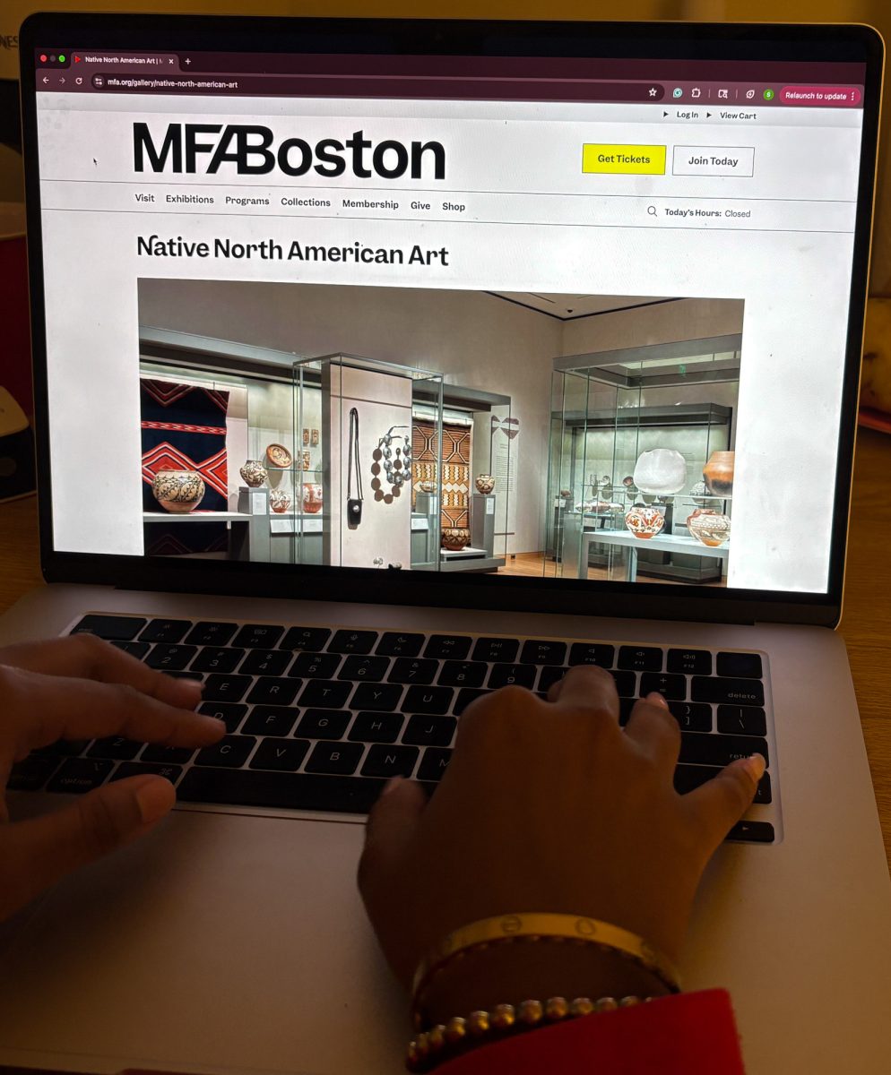 A student on the Museum of Fine Arts’ website page of North American Native American Art. Museums around Boston hosted several events and galleries to honor Indigenous People’s Day on Monday. 

