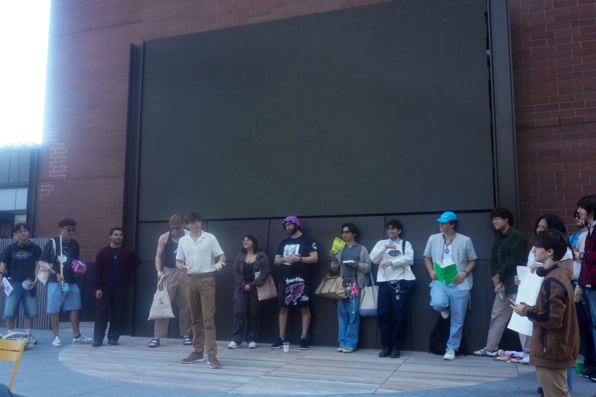 Competitors gather for the performative male contest hosted by Berklee College of Music student Emma Ababa. Berklee student Kelvin Francis was crowned the winner amongst 12 participants from several Boston-area schools. 