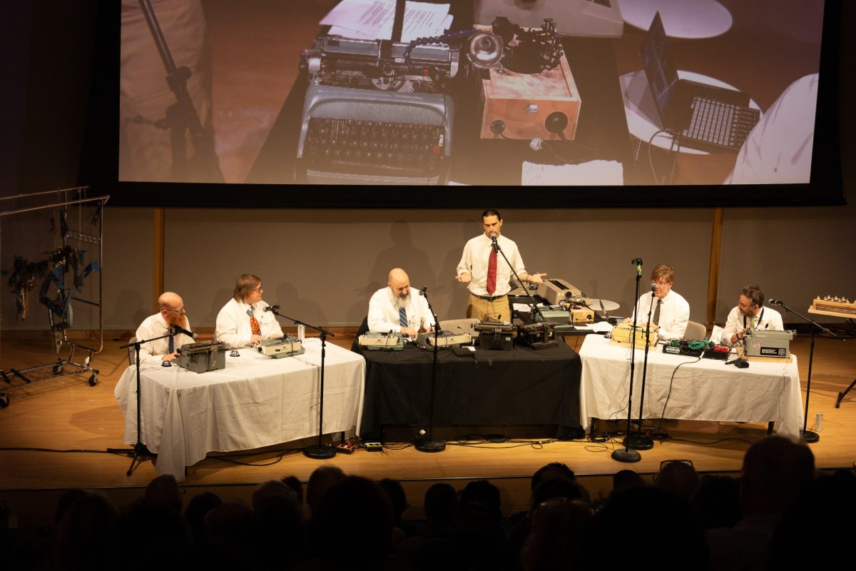 The Boston Typewriter Orchestra on Oct.16 at Boston Public Library Rabb Hall stage. The group performed “The Revolution Will Be Typewritten,” using different typewriters as instruments. 