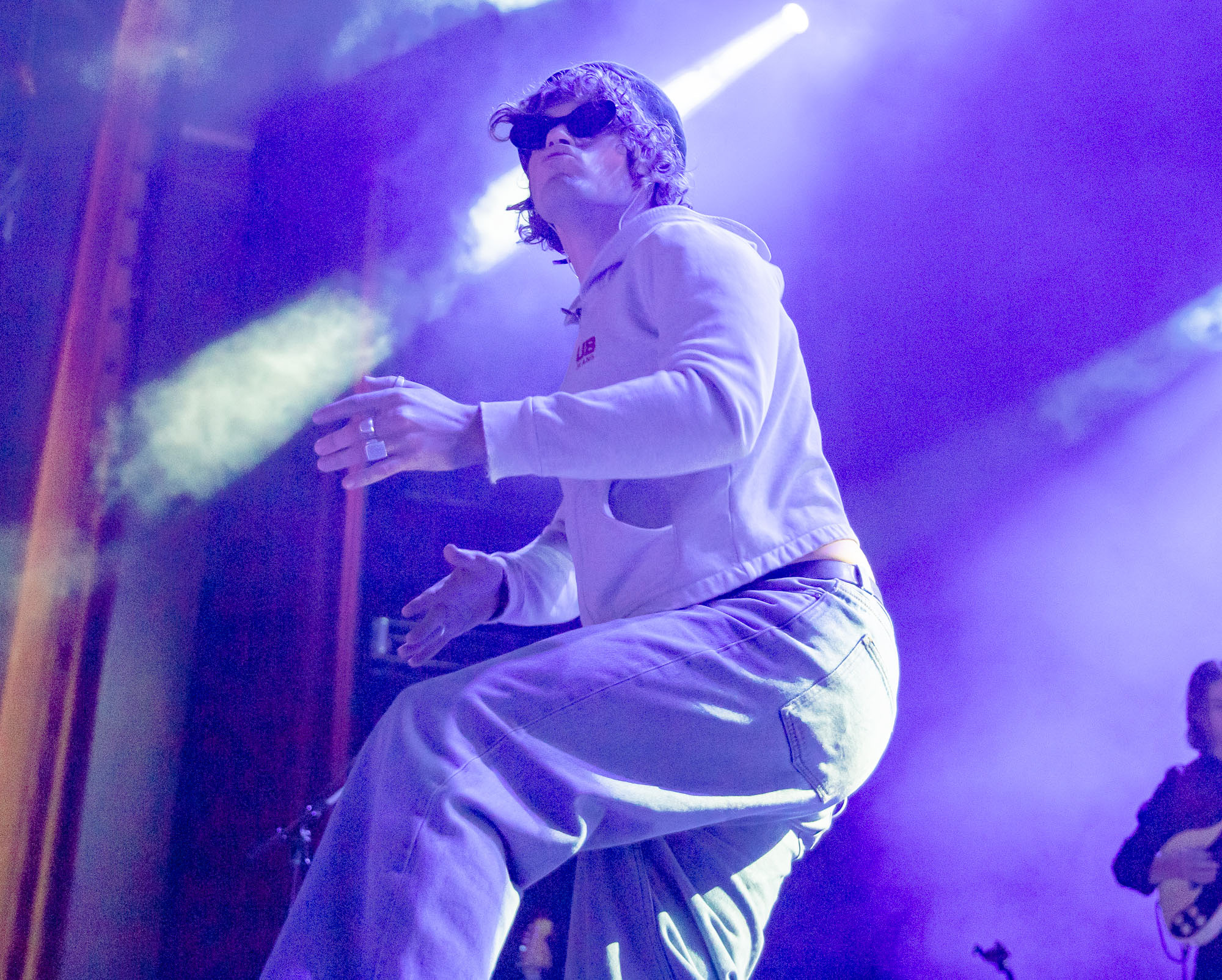 Dawson Daugherty, lead singer of almost monday, claps and dances around the stage.
