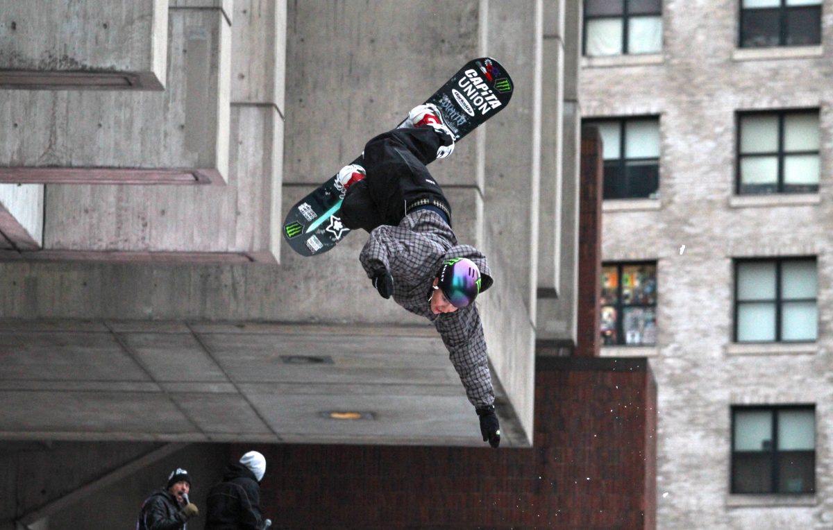 The 2025 Red Bull Heavy Metal champion Jess Perlmutter reaches out mid-air.