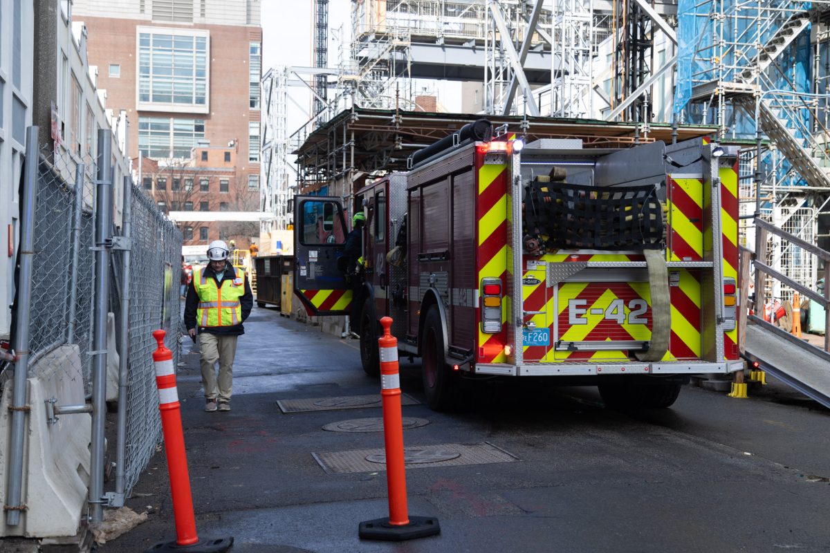 A fire truck parked on Cummington Mall, behind Warren Towers. This morning, a BU  alert informed students of a "large safety presence" at Warren Towers due to a medical emergency.