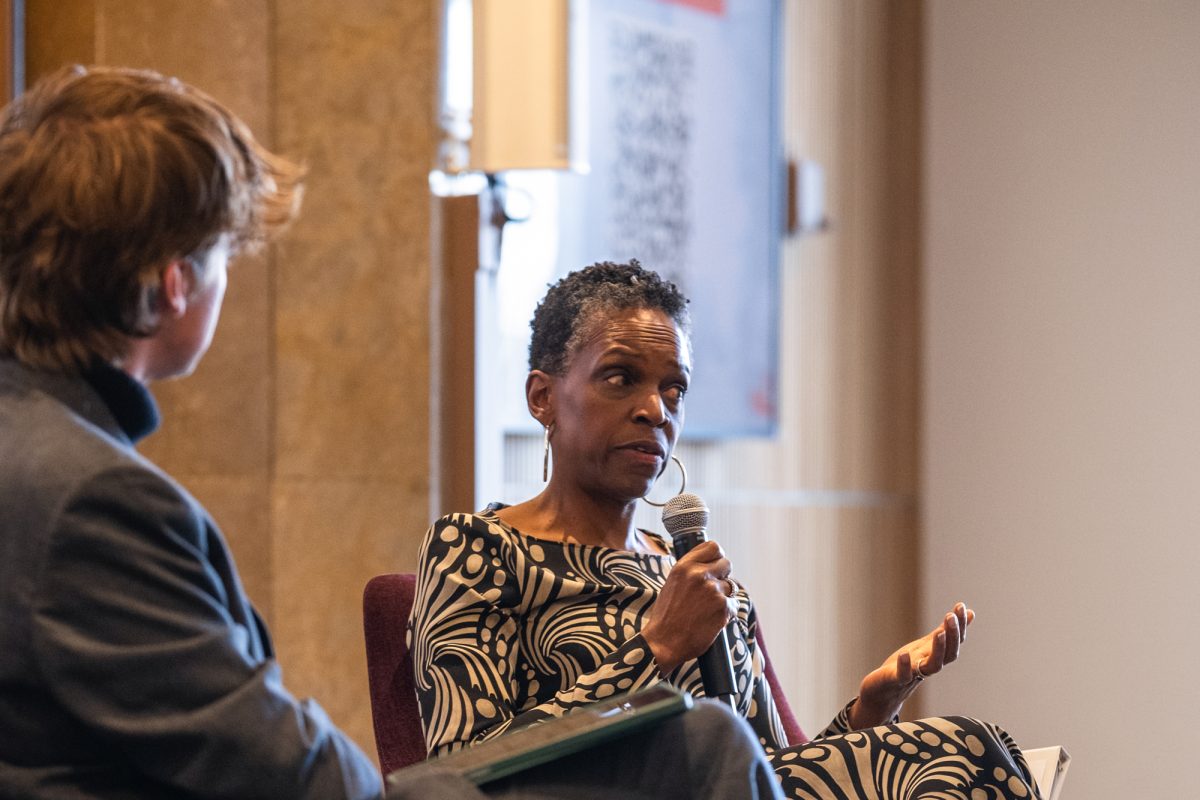 Boston University President Melissa Gilliam speaks opposite StuGov Co-Director of Engagement Cian Moss. Gilliam outlined the University’s values and challenges at a Town Hall Meeting April 6.