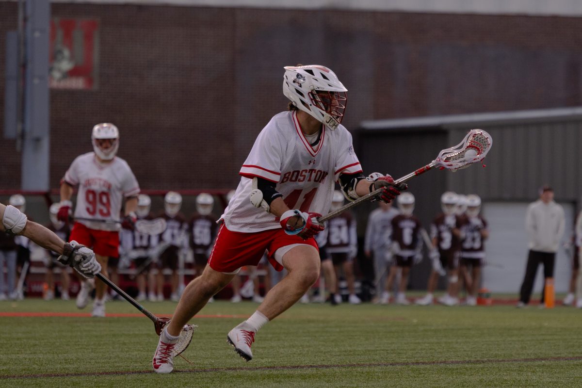 Freshman attack Peyton Forte (41) carries the ball into the Terriers’ offensive zone. Forte finished with four goals and an assist, despite the team’s 16-15 loss to the Lehigh Mountain Hawks.