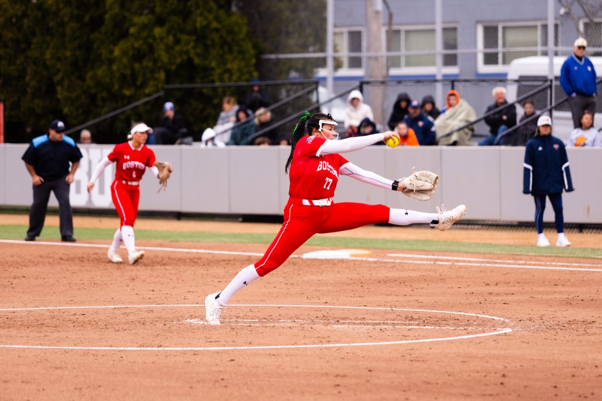 Senior pitcher Kasey Ricard (77) winds up for a pitch. In BU softball’s double-header sweep over the Colgate University Raiders, Ricard recorded her sixth career no-hitter in the second game, setting a new program record.