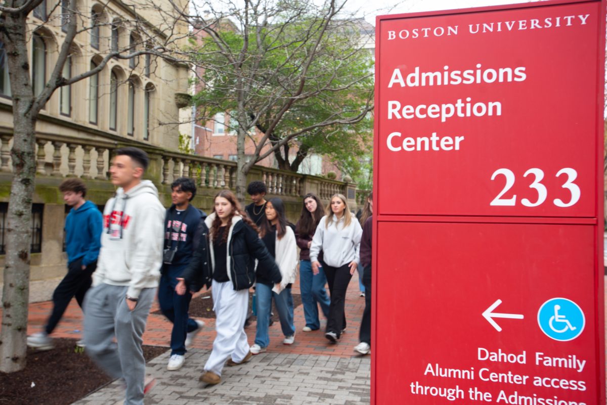 A Boston University campus tour group walks by the Admissions Reception Center. U.S. District Judge F. Dennis Saylor further restricted the scope of the Trump administration’s demand that universities provide admission data April 24.