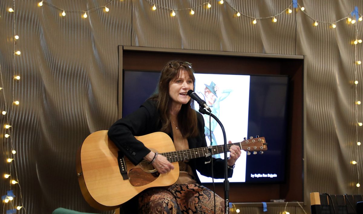 Natalie McKnight, BU professor and dean of the College of General Studies, performs at CGS’s annual Art Show Coffee House in March 2026. McKnight is stepping down as dean after 13 years in the role.