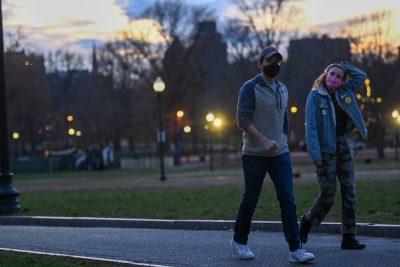 two people walking through boston common