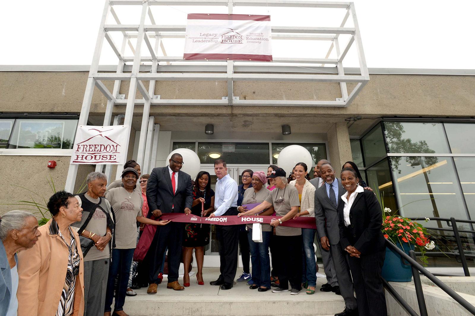Mayor Martin Walsh cuts the ribbon to new Freedom House education facility at Grove Hall Library Sept. 16. PHOTO COURTESY CITY OF BOSTON