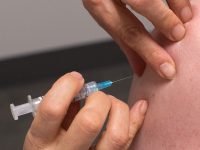 vaccine injection into an arm