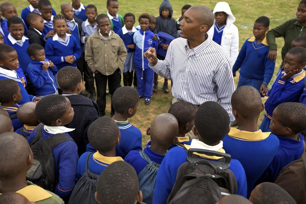 A Peace Corps volunteer teaching children in Lesotho to build self-esteem and leadership skills through partaking in outdoor activities. COURTESY OF THE PEACE CORPS/ FLICKR 