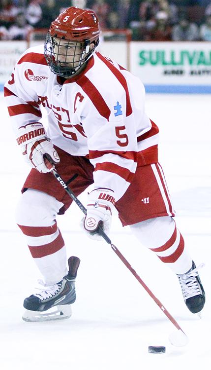 Junior captain Matt Grzelcyk notched three points in the third period Friday against UMass Amherst. PHOTO BY MAYA DEVEREAUX/DAILY FREE PRESS 