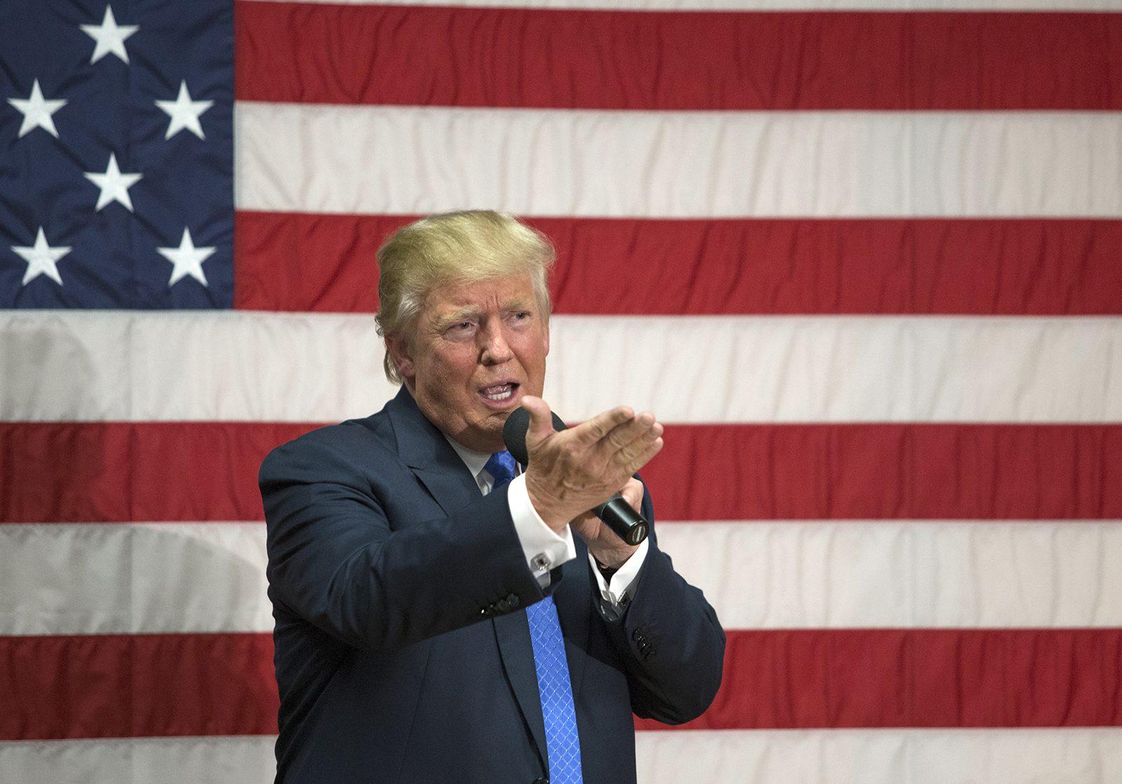 Trump offers his opinions about the news media, many of which were situated in the rear of the hall. PHOTO BY SARAH SILBIGER/ DAILY FREE PRESS STAFF 