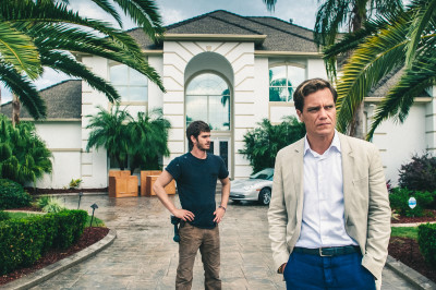99Homes_00014_CROP (l to r) Andrew Garfield stars as 'Dennis Nash' and Michael Shannon as 'Rick Carver' in Broad Green Pictures upcoming release, 99 HOMES. Credit: Hooman Bahrani / Broad Green Pictures
