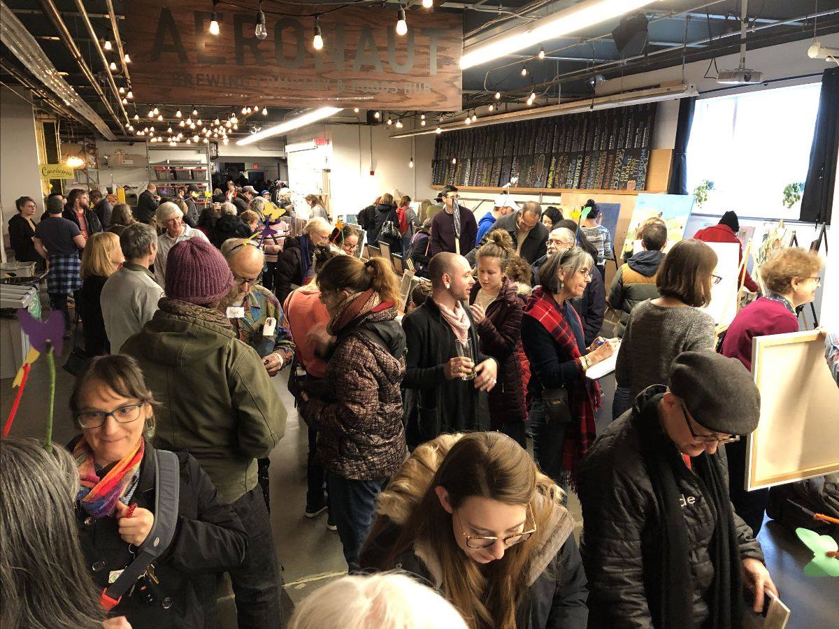 A crowd of attendees at Art For All 2, hosted by community-based organization Boston For All, at Aeronaut Brewing Boston on Nov. 17. COURTESY OF MICHAEL BOEZI