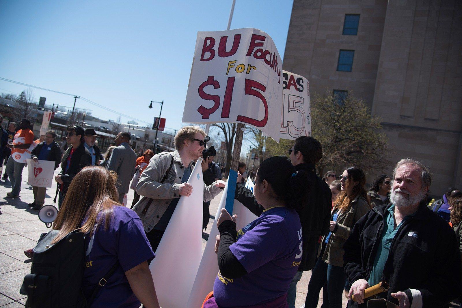 Protestors call for higher wages for adjunct professors in Marsh Plaza in 2016. Boston University is currently negotiating a new contract with the adjunct faculty representative union. PHOTO BY LEXI PLINE/ DFP FILE