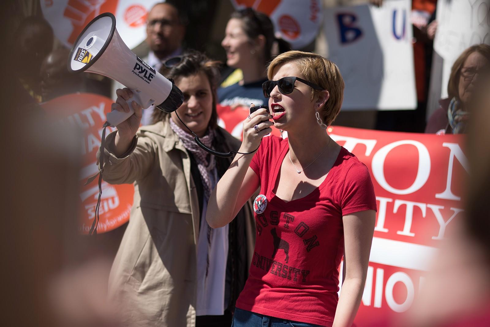 A member of the Student Curriculum Committee speaks at the beginning of the rally in Marsh Plaza about how student awareness is important for change. PHOTO BY LEXI PLINE/DAILY FREE PRESS STAFF