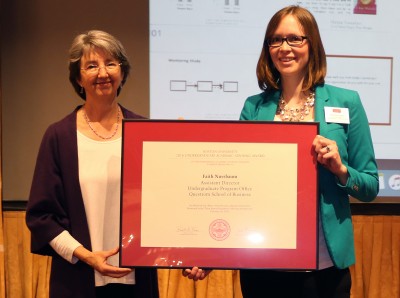 Faith Nussbaum, assistant director in the Undergraduate Program Office in the Questrom School of Business, receives one of the first BU Undergraduate Academic Advising Awards given at the third Annual Academic Advising Symposium on Friday afternoon. PHOTO BY ANNALYN KUMAR/DAILY FREE PRESS STAFF