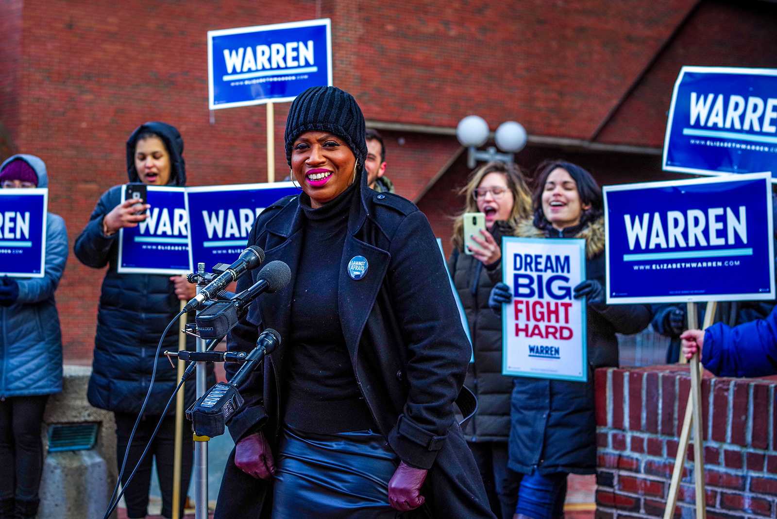 U.S. Rep. Ayanna Pressley speaks to Sen. Elizabeth Warren supporters at City Hall Plaza Friday as the campaign ramped up canvassing efforts before Super Tuesday. ANGELA YANG/ DAILY FREE PRESS STAFF