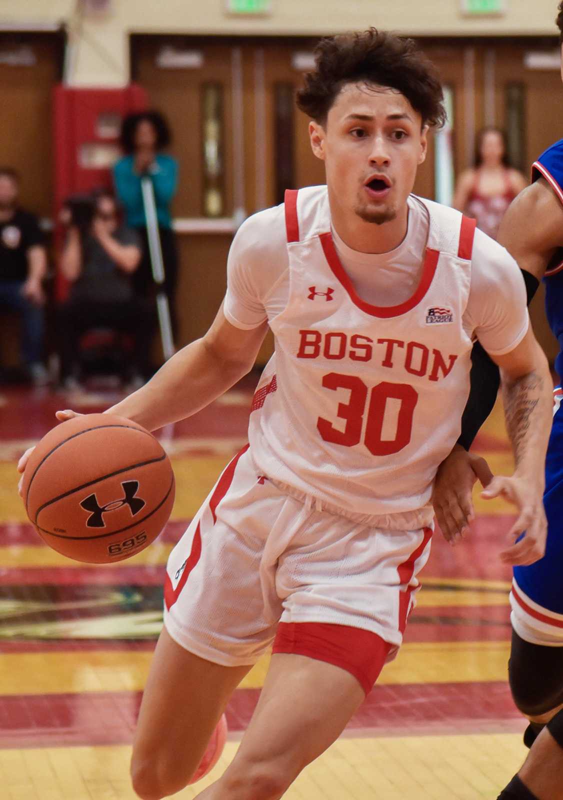 Junior guard Javante McCoy, shown in the Feb. 23 game against American University, was named to the All-Patriot League third team earlier this week and became the 39th Terrier in program history to score 1,000 points last week. ANRAN XIE/ DFP FILE
