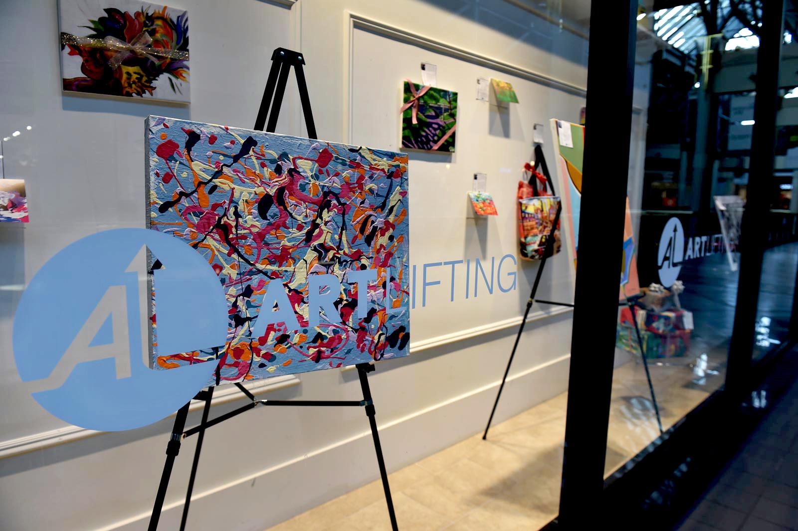 ArtLifting, a program that benefits homeless and disabled artists, opened a pop-up store in CambridgeSide Galleria Jan. 9, which runs through Jan. 31. PHOTO BY MADDIE MALHOTRA/DAILY FREE PRESS STAFF