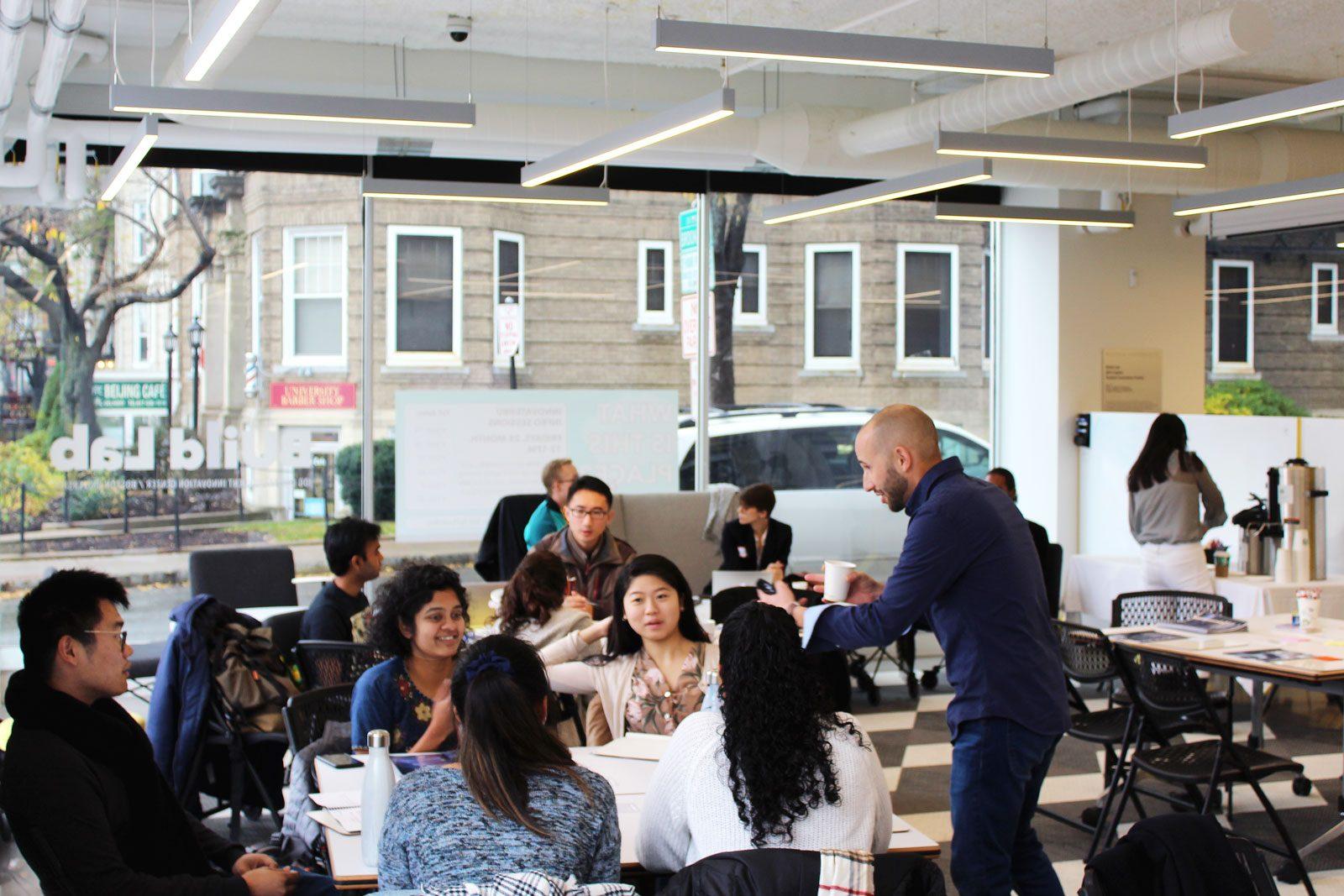 Zach Mercurio, author and strategist, speaks to students at a bootcamp aimed at helping students and alumni alike navigate life after graduation. RACHEL SHARPLES/ DAILY FREE PRESS STAFF