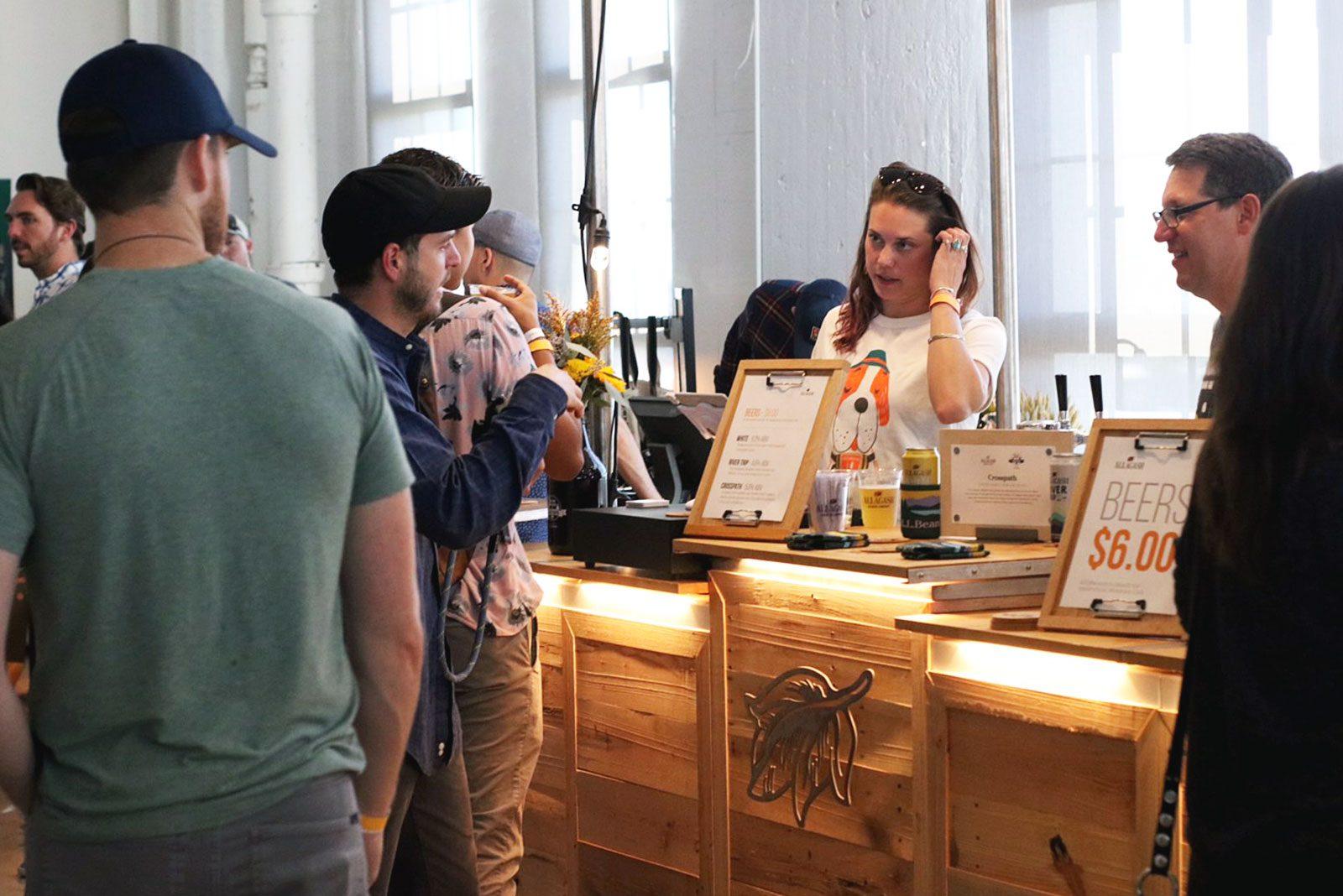 Attendees talk to a vendor at Boston AF, a pop-up marketplace that took place this past weekend at Boston’s Innovation and Design Building. CHIKA OKOYE/ DAILY FREE PRESS STAFF