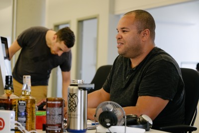  Christopher Grandoit, software testing manager at the startup company Toast, works at his desk at Hatch Fenway Wednesday morning. Hatch Fenway is a startup that provides affordable workspaces for Boston-based startups to launch their businesses. PHOTO BY BRIAN SONG/DAILY FREE PRESS STAFF
