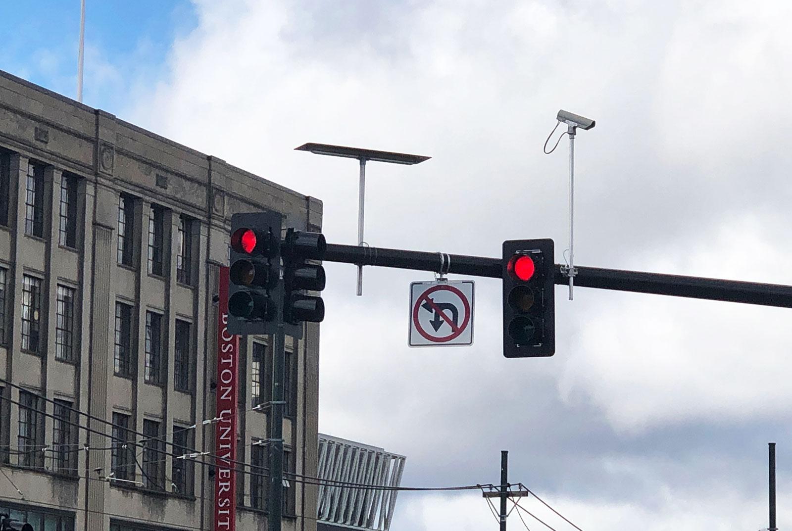 Traffic lights on Commonwealth Ave. The Mass. State Senate voted to approve the installation of cameras to photograph drivers who run red lights Thursday. BAILEY SHEN/ DAILY FREE PRESS STAFF