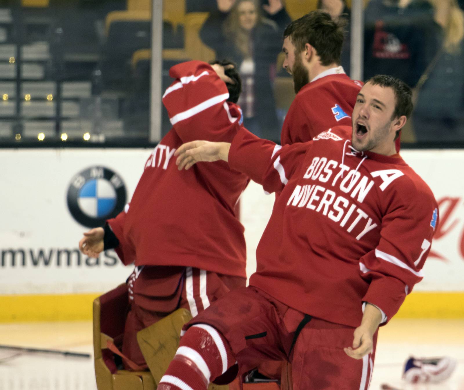 Cason Hohmann rejoices following BU's 4-3 victory over crosstown rival Northeastern University in Monday's Beanpot final at TD Garden.  PHOTO BY JUSTIN HAWK/DAILY FREE PRESS STAFF