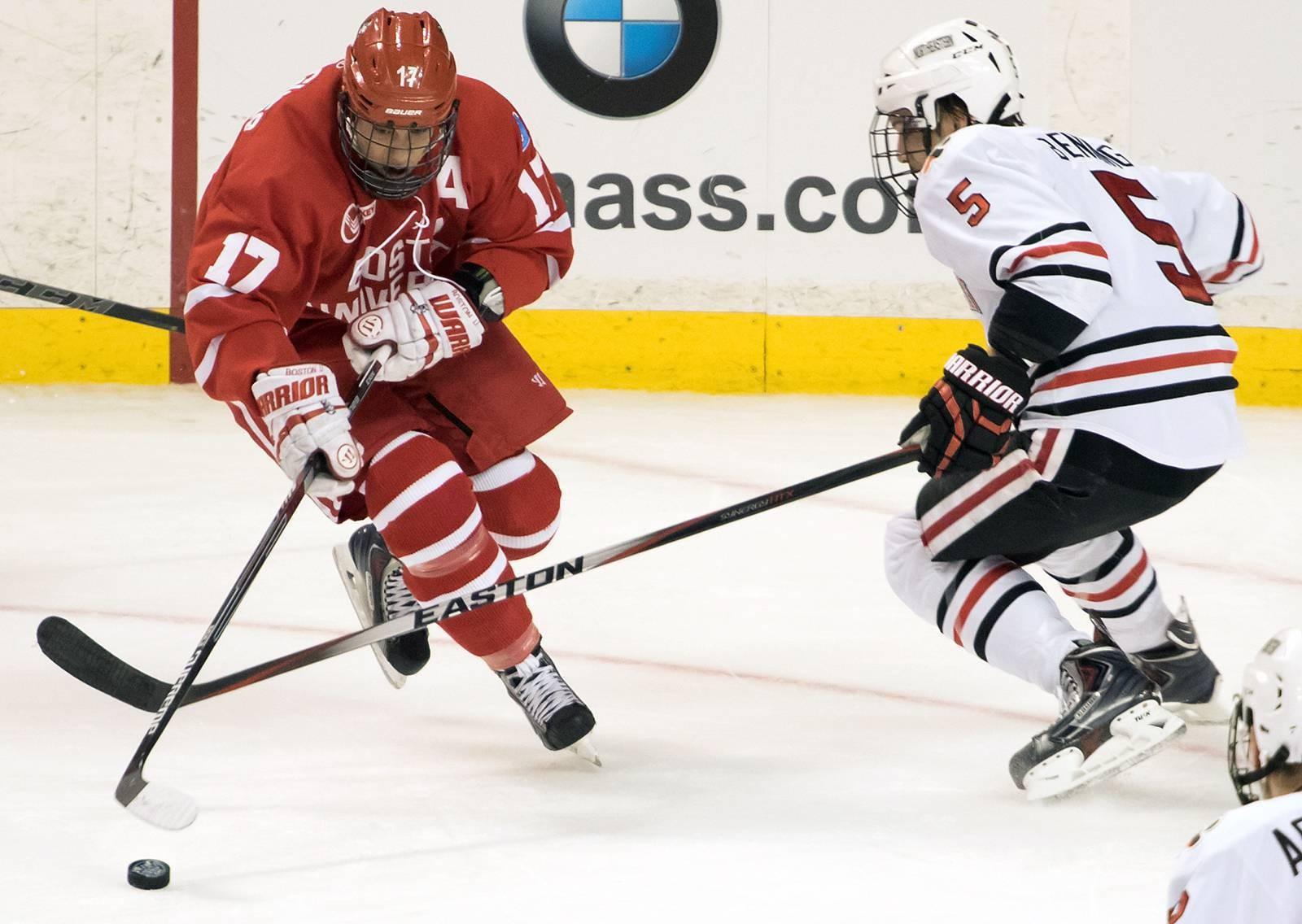 Senior assistant captain Evan Rodrigues assisted on junior defensemen's Matt Grzelcyk's overtime goal to help the No.4 Boston University men's hockey team defeat Northeastern University and claim the program's 30th Beanpot title. PHOTO BY JUSTIN HAWK / DAILY FREE PRESS STAFF