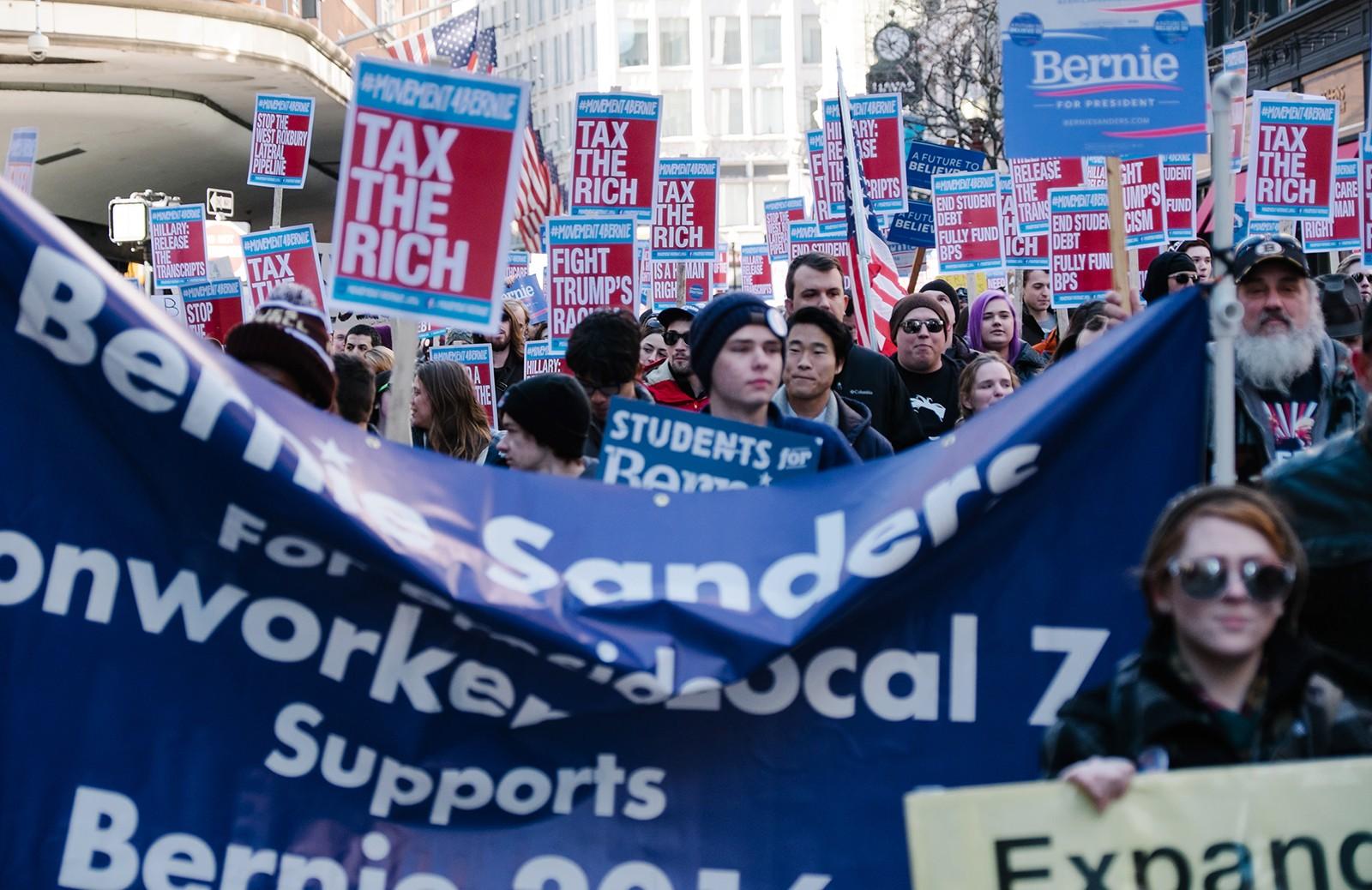 The crowd marches around Downtown Boston. PHOTO BY BRIAN SONG/DAILY FREE PRESS STAFF