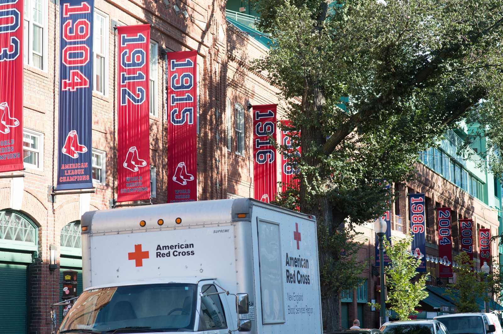 American Red Cross trucks line Yawkey Way during the September 11th Day of Remembrance Blood Drive held at Fenway Park. PHOTO BY MADDIE MALHOTRA/ DAILY FREE PRESS STAFF