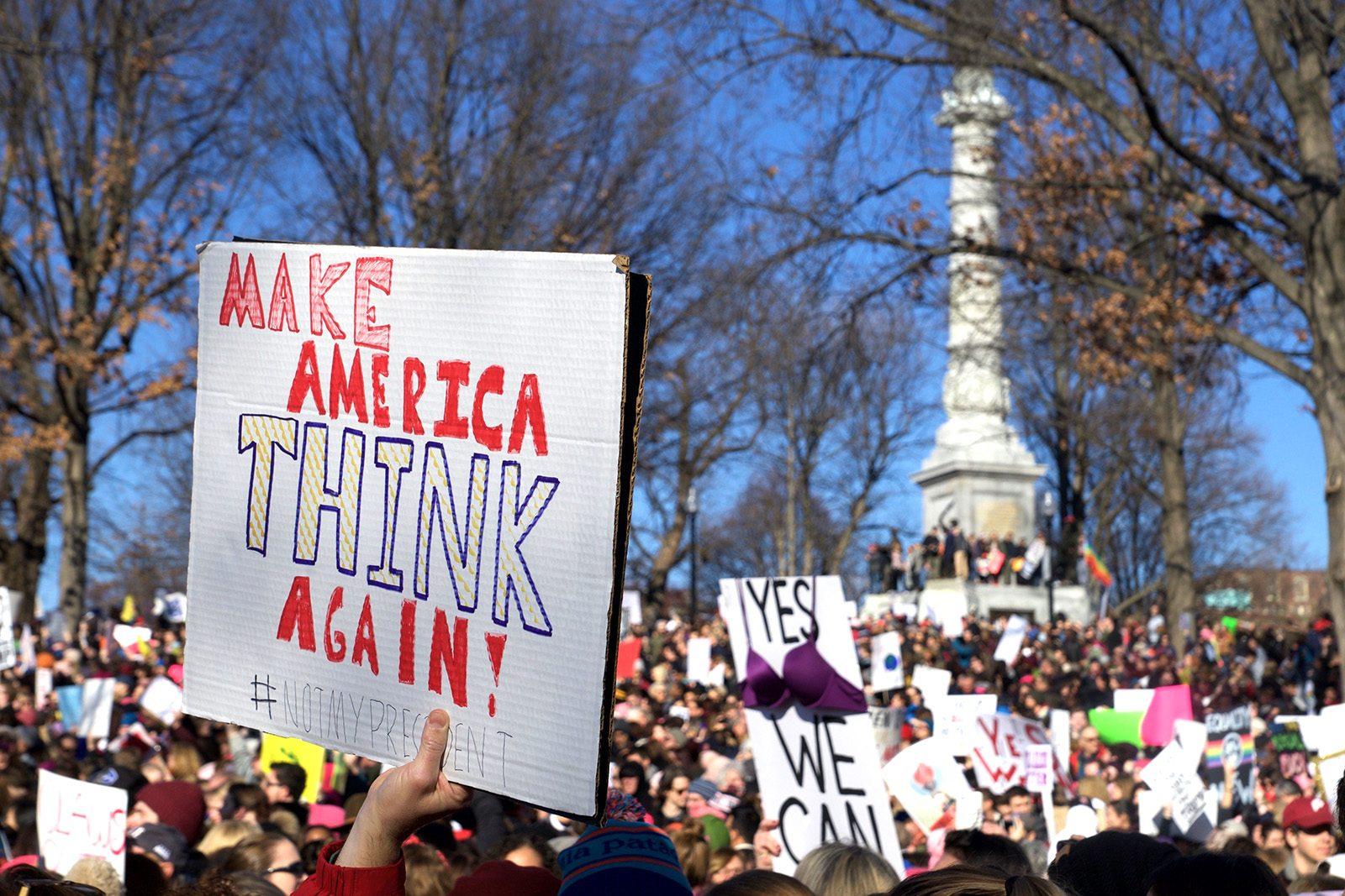 A spectator holds up a sign at the Boston Women’s March on Jan. 21. PHOTO BY SYDNEY MAES/ DAILY FREE PRESS STAFF