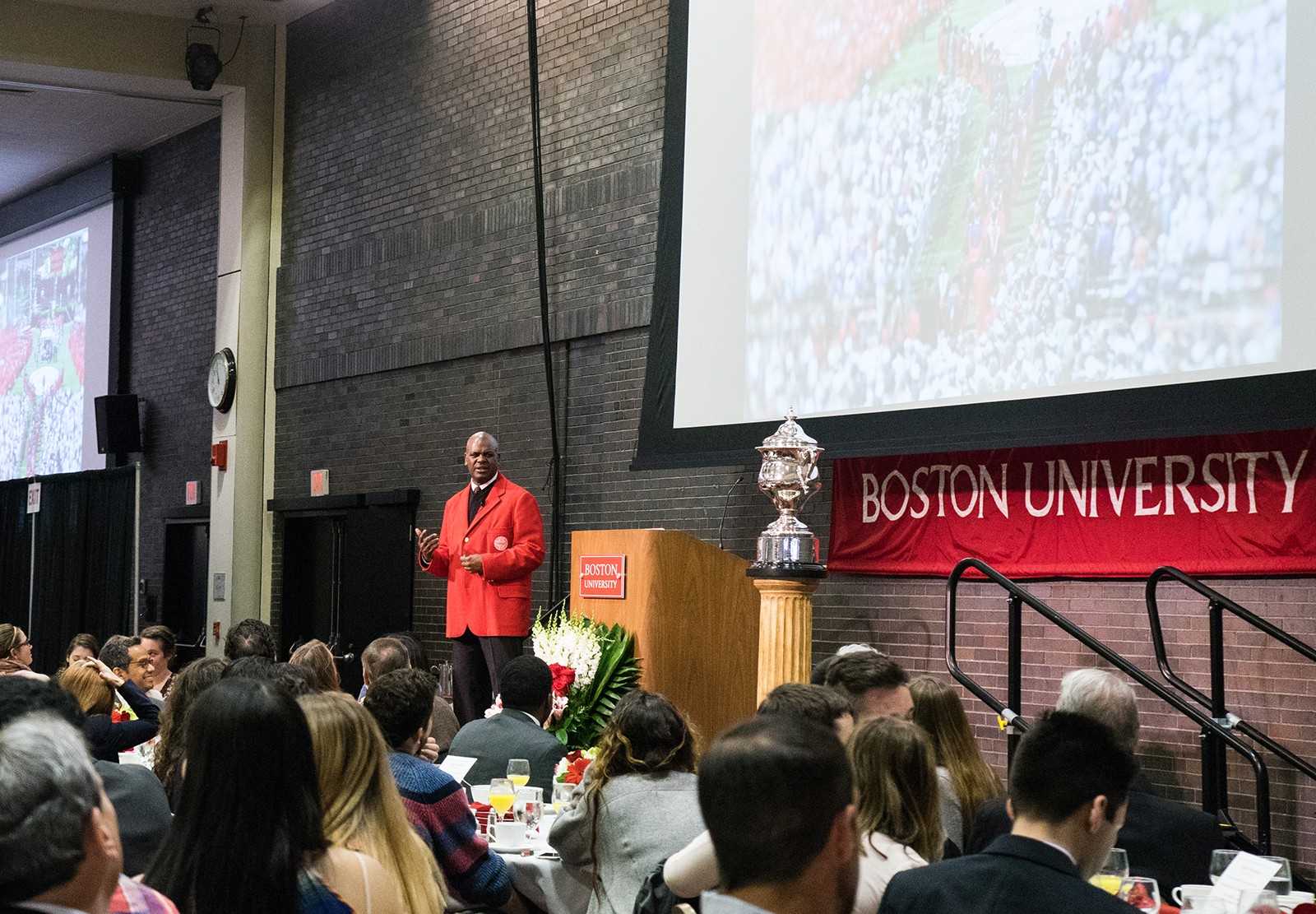Dean of Students Kenneth Elmore addresses students during the senior breakfast Monday morning. PHOTO BY KANKANIT WIRIYASAJJA/ DAILY FREE PRESS STAFF 
