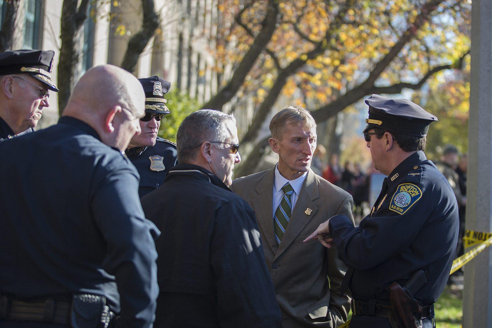 Boston Police Commissioner William Evans speaks to law enforcement officials outside of Mugar Memorial Library Friday morning. PHOTO BY SARAH SILBIGER/ DAILY FREE PRESS STAFF