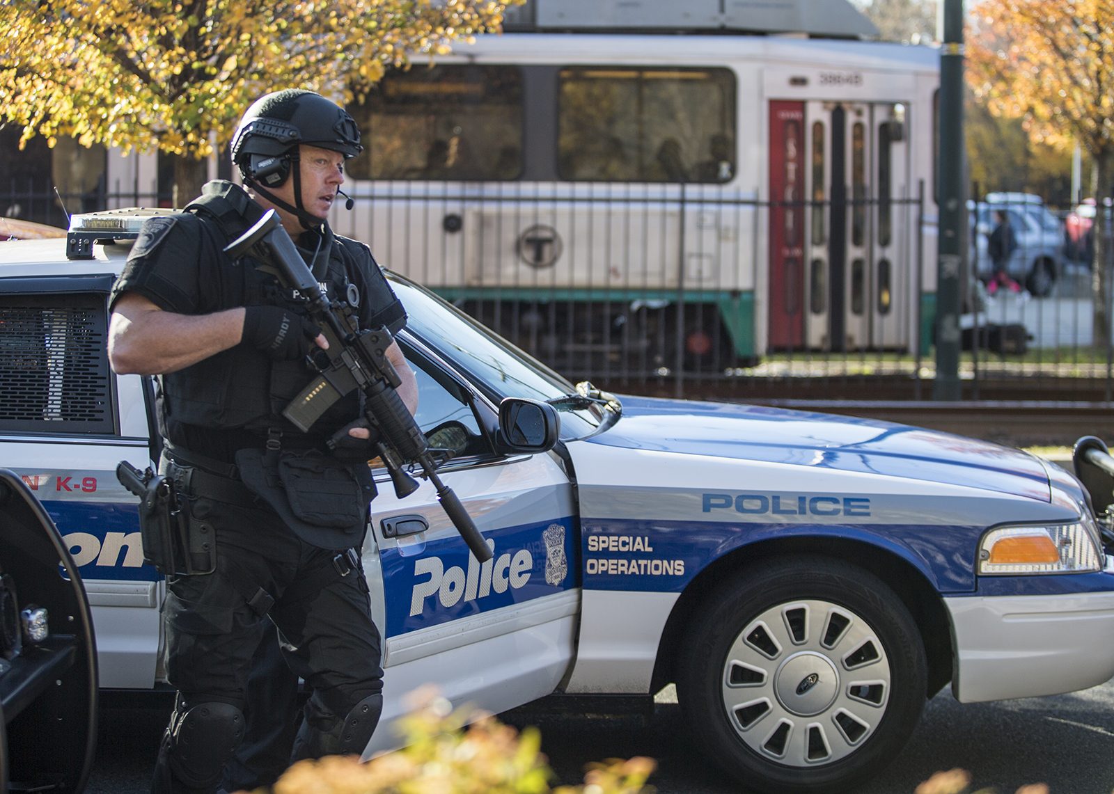 A law enforcement official on the scene after a hoax call was made to BUPD's dispatch center warning of guns and bombs in Mugar Memorial Library Friday morning. PHOTO BY SARAH SILBIGER/ DAILY FREE PRESS STAFF