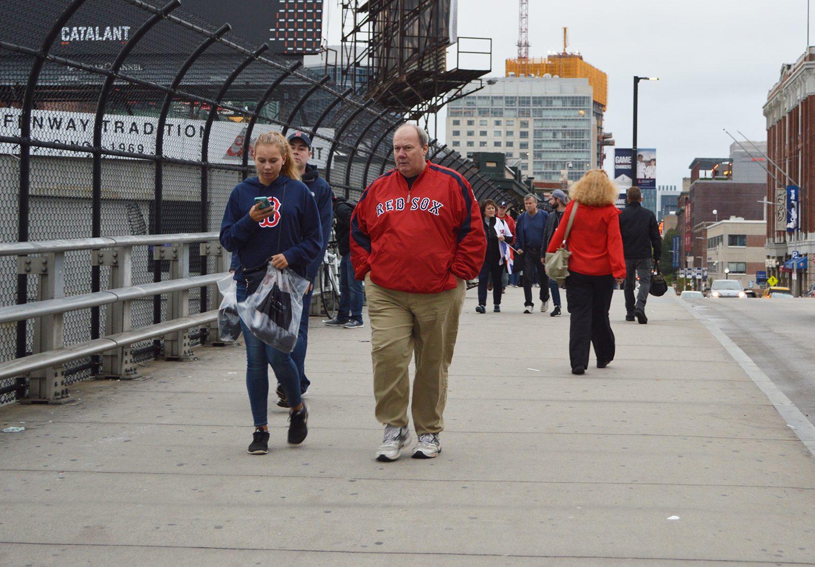 Red Sox fans cross the Brookline Avenue Bridge after David Ortiz’s final regular season game at Fenway Park Sunday. PHOTO BY CAROLYN KOMATSOULIS/ DAILY FREE PRESS CONTRIBUTOR