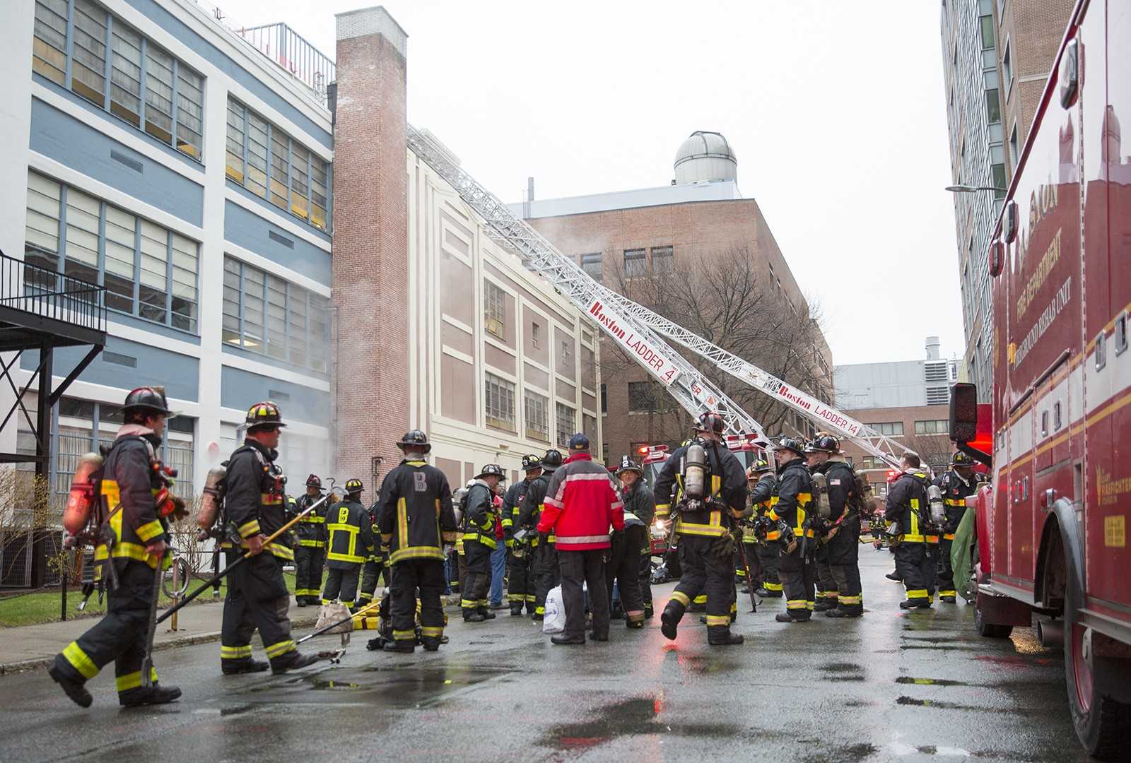 First responders await further instruction. PHOTO BY SARAH SILBIGER/DAILY FREE PRESS STAFF