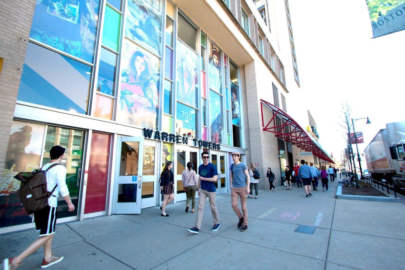 Students walk on campus in front of Warren Towers. At the end of this week, Boston University is hosting its annual Family and Friends Weekend, with a full schedule of events that students and their families can attend. NICKI GITTER/ DFP FILE