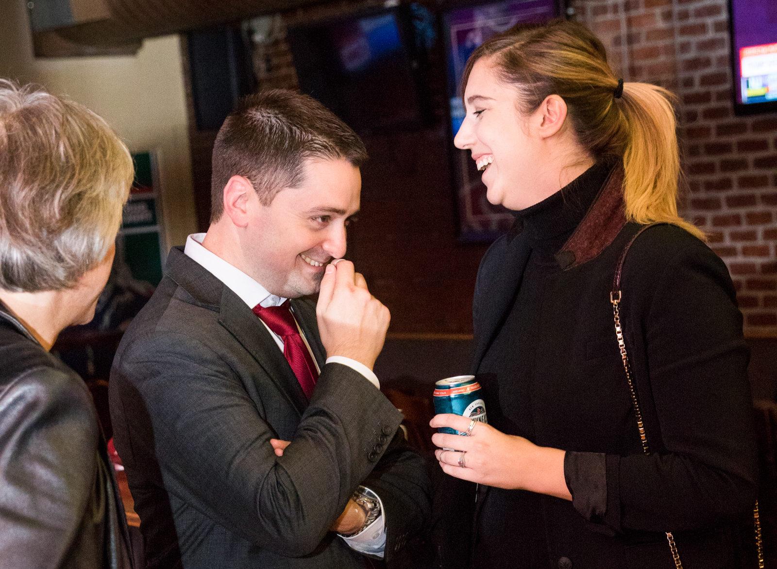 Josh Zakim winds down the evening laughing with supporters at his election watch party at the Baseball Tavern Tuesday night. Incumbent Zakim beat challenger Kristin Mobilia. PHOTO BY JOHN KAVOURIS/ DAILY FREE PRESS STAFF