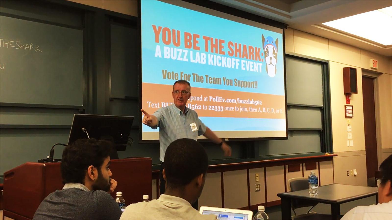 Ian Mashiter, director of the BUzz Lab, speaks at the startup competition “You Be the Shark” at the Questrom Auditorium and Chiles Atrium Friday night. PHOTO JENNI TODD/ DAILY FREE PRESS STAFF
